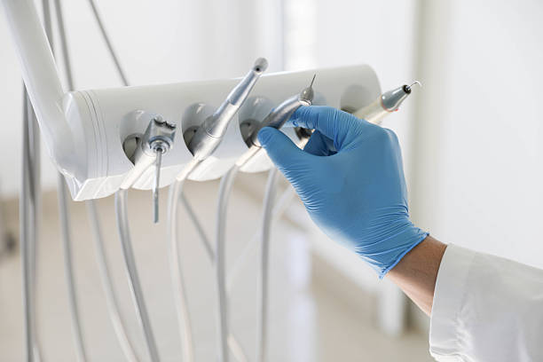 Professional Invisalign Clear Aligners technician working in Almont, MI